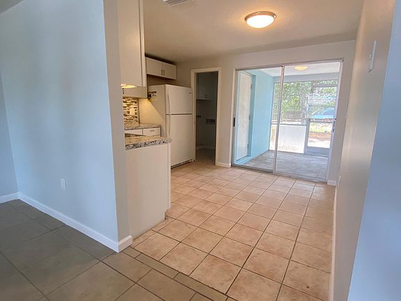 View towards screened in lanai and kitchen.