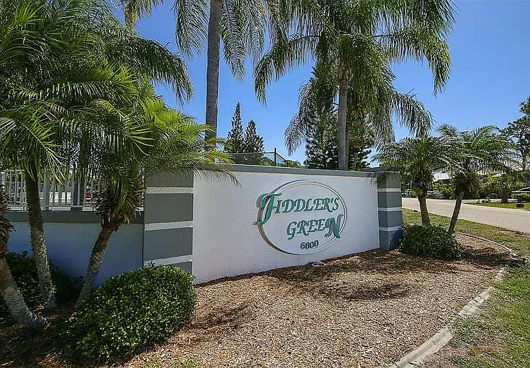 Welcome home to Fiddler's Green. __ There's no better feeling than pulling through these gates and knowing you've officially arrived in paradise. Your Englewood escape starts right here!