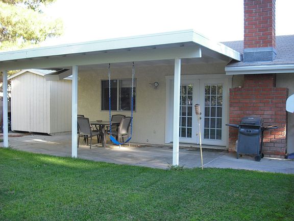 Backyard with covered patio