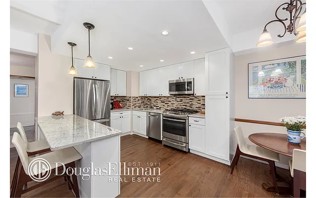 Sold by Douglas Elliman | media 9