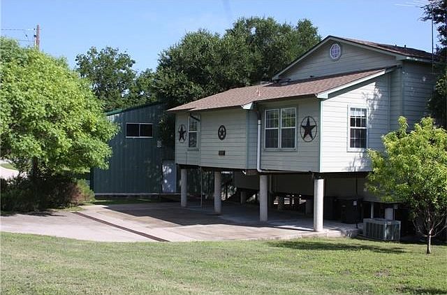Perfect lake house or retreat.  Three car huge garage in green next to house.  Will hold three RV's plus boats & trailers.