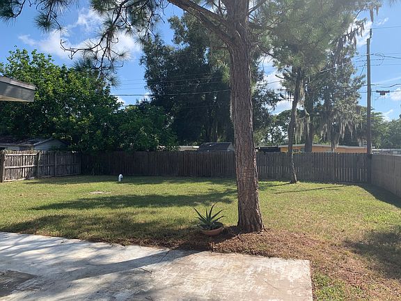 Back yard with cement deck 