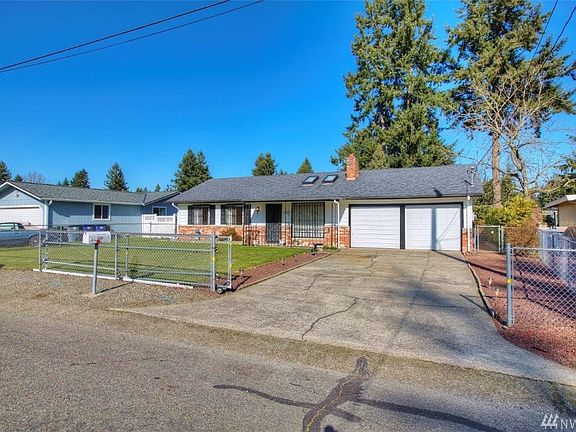 Gorgeous landscaping and curb appeal with fully fenced yard! 