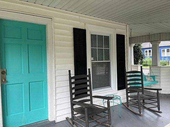 front porch with rocking chairs and porch swing!