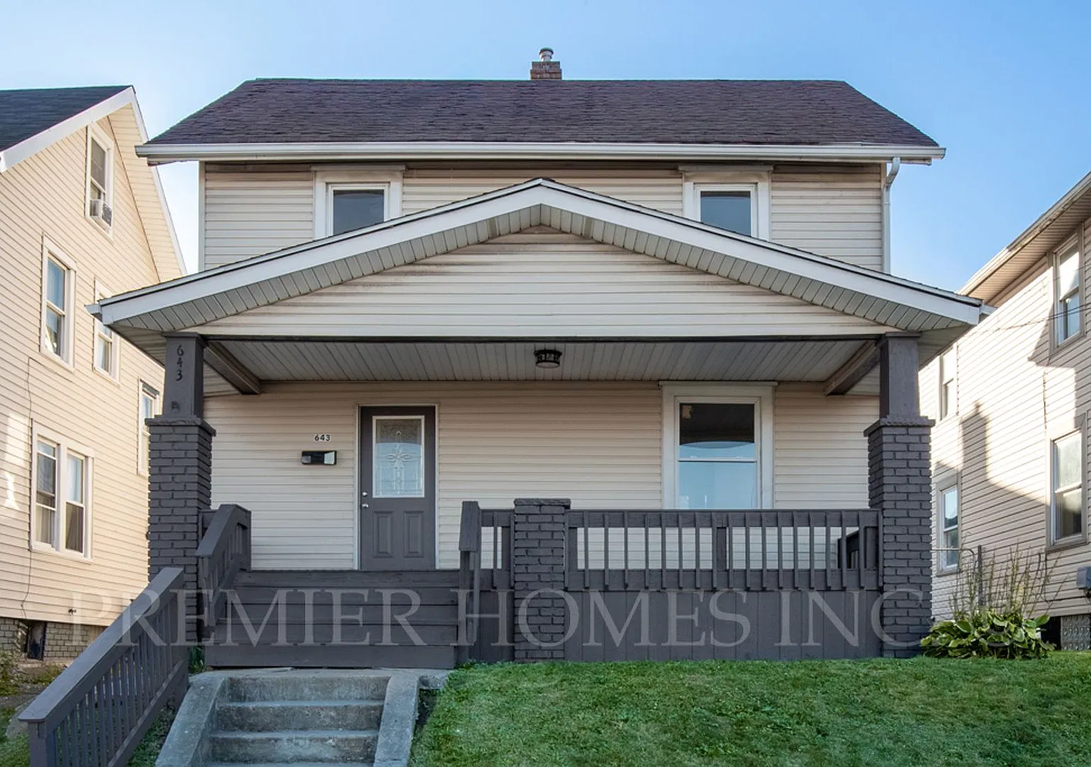 Classic 2-Story with Covered Front Porch, Original Hardwoods, Fenced Yard & Full Basement! -643 F... — Photo 1