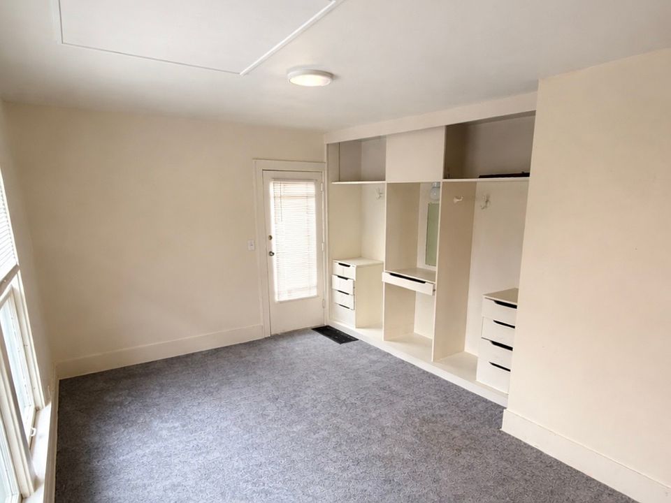Main living/bedroom area - backdoor entrance