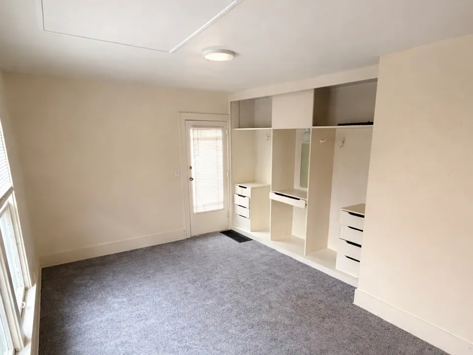 Main living/bedroom area - backdoor entrance