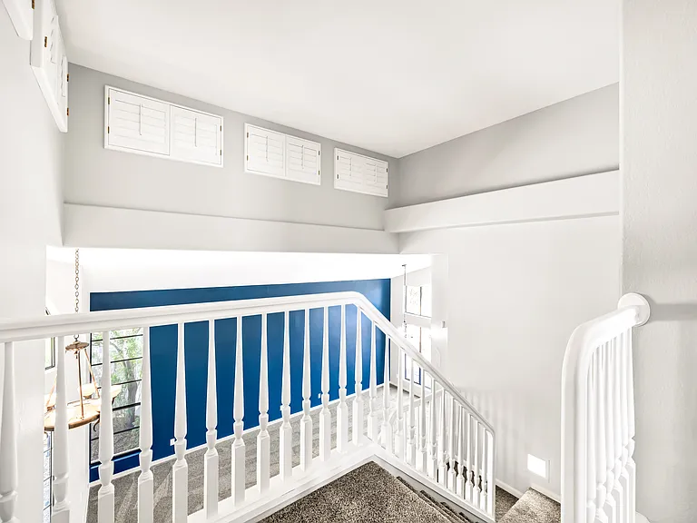 View from upstairs down into the living room.