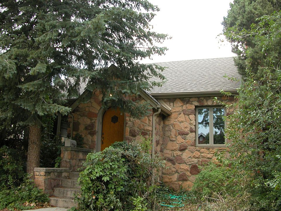 Quaint cottage exterior, with efficient hot water heating