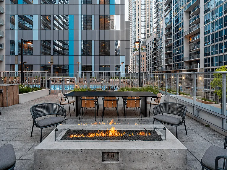 Unwind by the fire pit or enjoy outdoor dining with BBQ grills and stunning city views