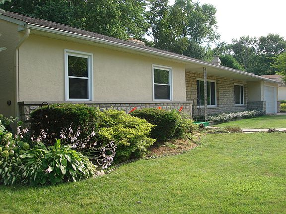 Exterior Front - replacement windows and doors throughout