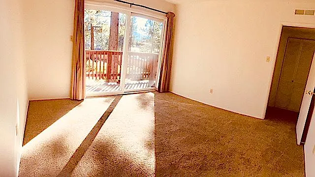 Rear bedroom with deck & views