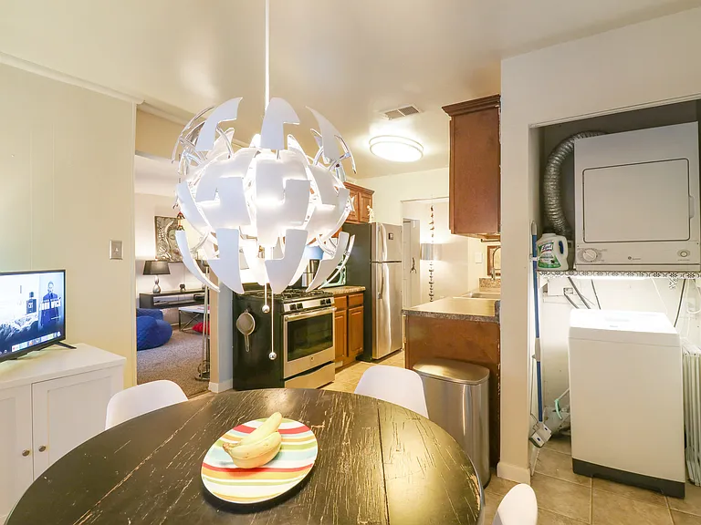 Washer & Dryer, dishwasher, microwave, airfryer, glasses, dishes, silverware.