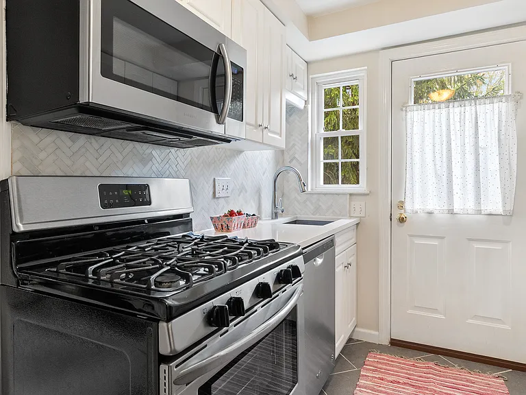 Brand New Kitchen, with door to outside deck