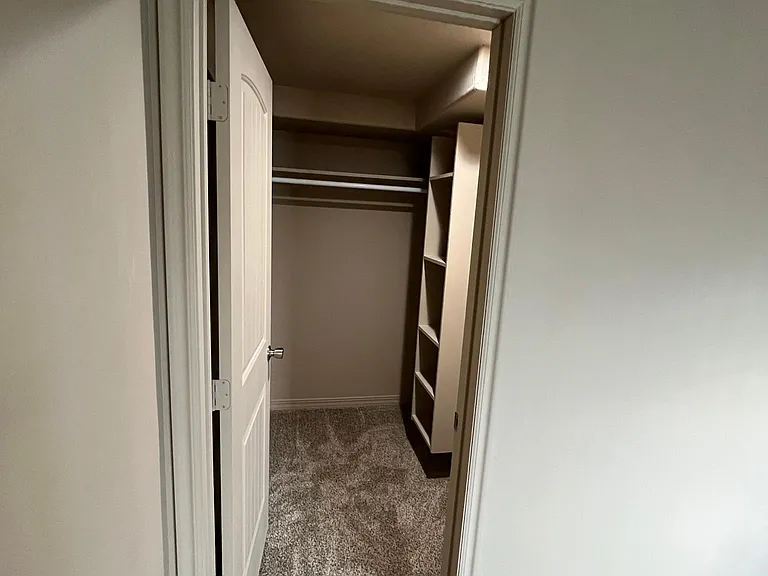 Walk in closet for the primary bedroom
