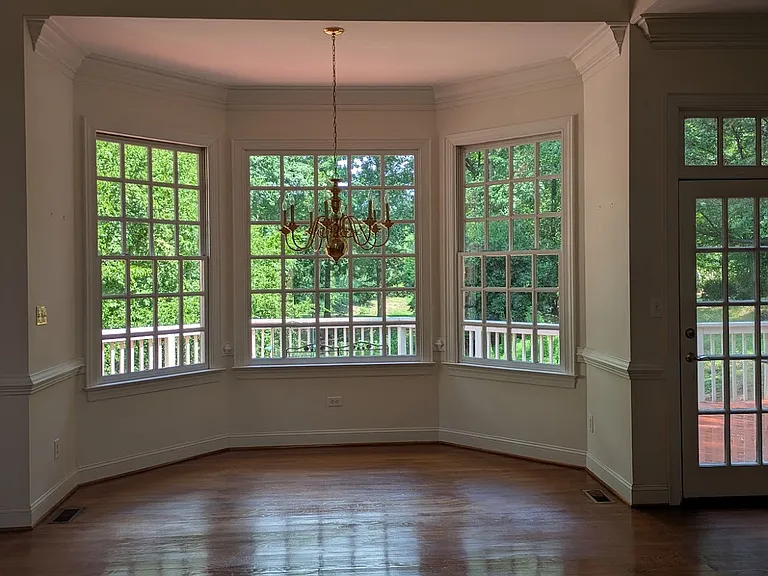 Formal dining alcove area, facing towards the golf fairway. Deck is behind this window overlooking the view.