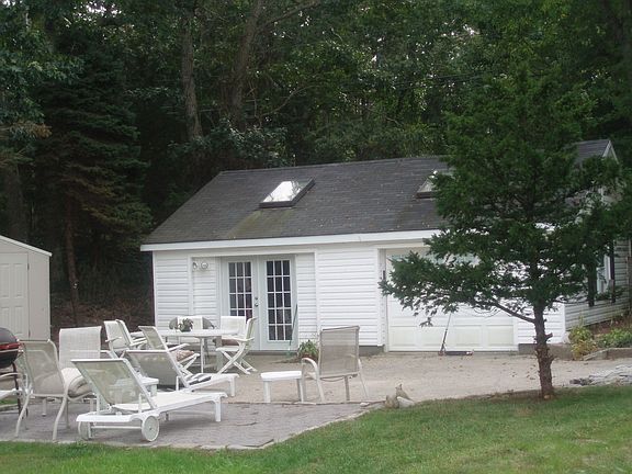 Large patio between the 2 structures.