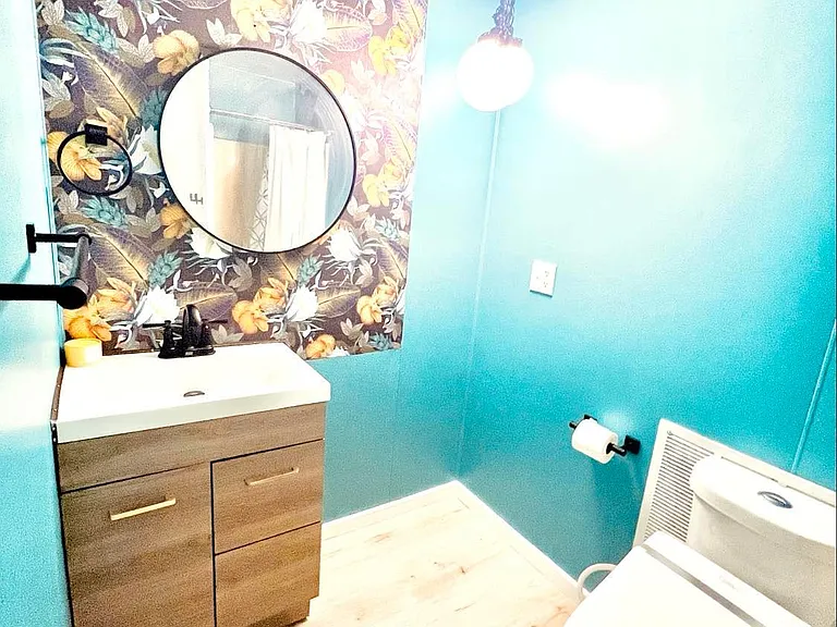 Masterbath is almost done.. and the pictures don't do it justice. There will be a thick storage shelf just to the right of the new vanity. Gorgeous sturdy modern black fixtures accent teal paint.
