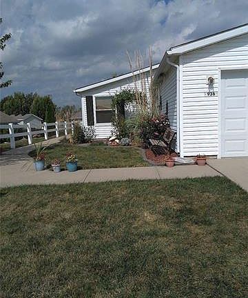 4th image of 936 NE White Oaks Ln