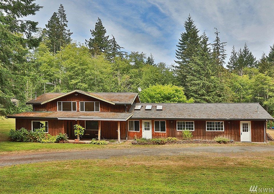 Spacious fixer home on acreage awaits new owners. 