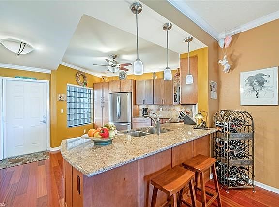 Breakfast bar looking into the kitchen.