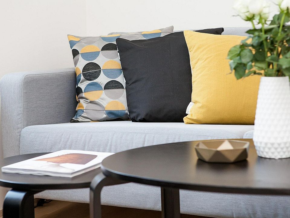 Experience the comfort of this chic living area, perfect for relaxation and stylish living.