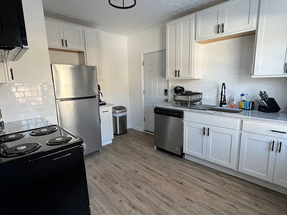 No-slam cabinets, granite countertops and newer appliances complete this great kitchen