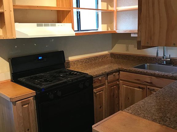 Kitchen looking North-east. Gas range.