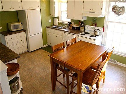 Spacious Kitchen with hardwood cabinets & eat-in dining