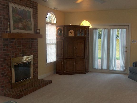 Fireside Family Room with Atrium Doors to Patio