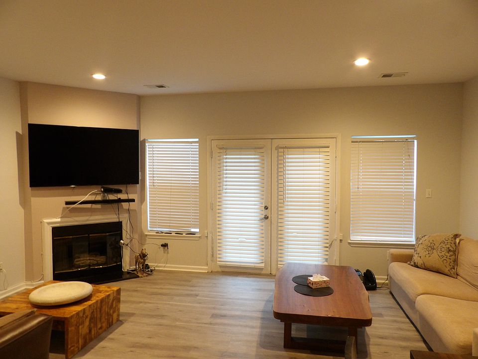 Open floor plan...Living Rm w/fireplace and doors to patio!