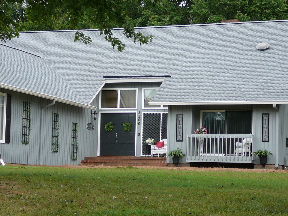 Front of Home w/ Balcony