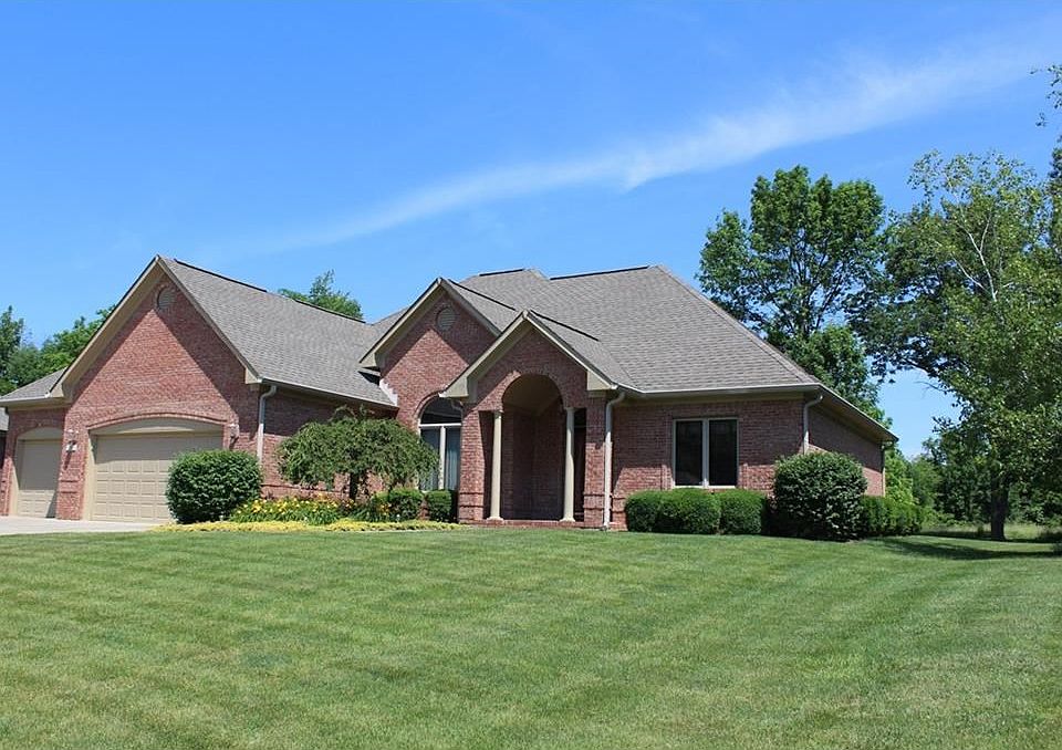 Loads of curb appeal on this custom brick ranch located in desirable Pioneer Country Estates