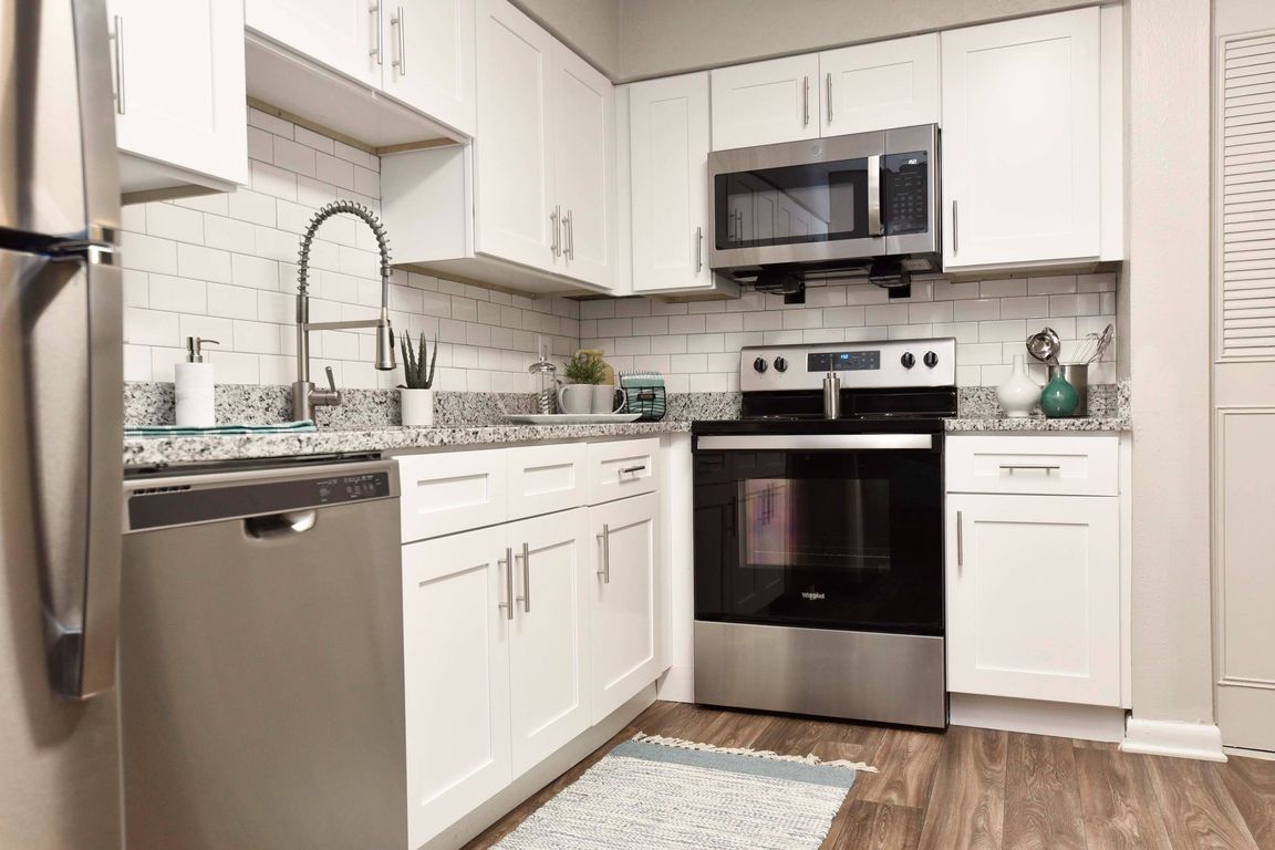 Wood Style Flooring and New Cabinetry, Granite Counters, Stainless Appliances