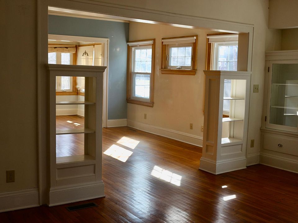 Living/dining/sunroom open flor plan. Lots of light.