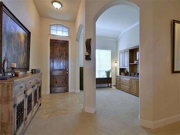 Enter this beautiful home through a Solid Wooden Door.  The home features 13" ceiling throughout.