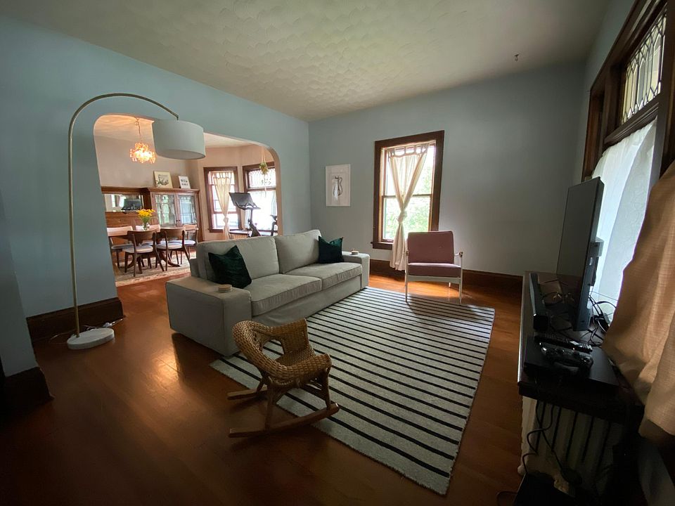 Living room is spacious and opens to formal dining room