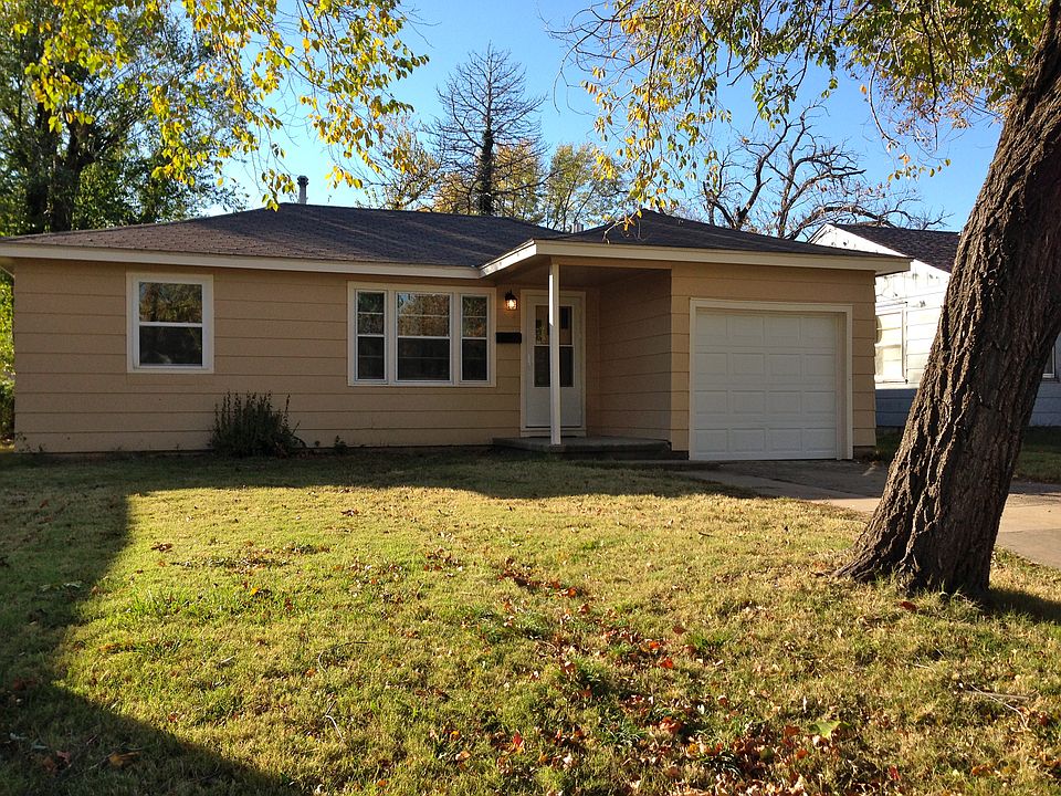 NEW PAINT & GARAGE DOOR