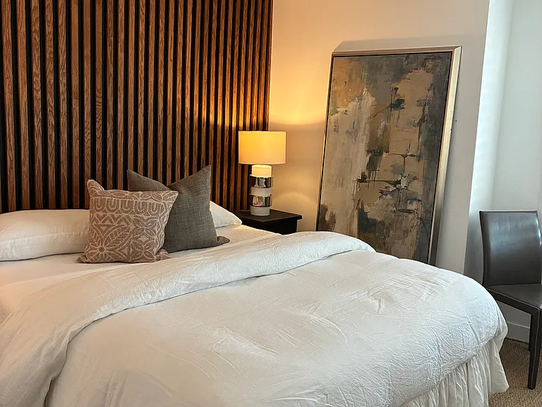 Fan above bed