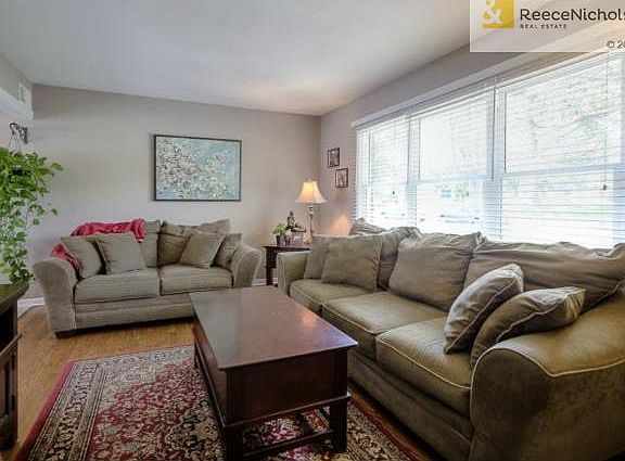 VIEW OF FRONT LIVING ROOM.