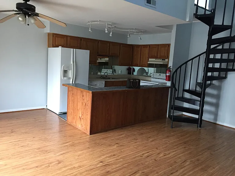 KITCHEN/STAIRCASE TO LOFT'S 2ND BEDROOM