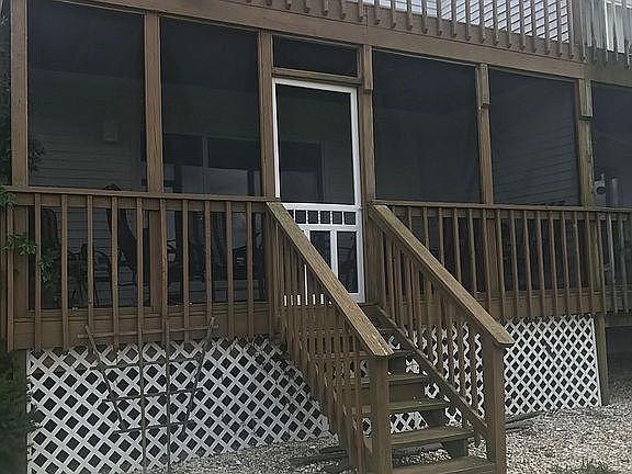 Screend porch facing the bay