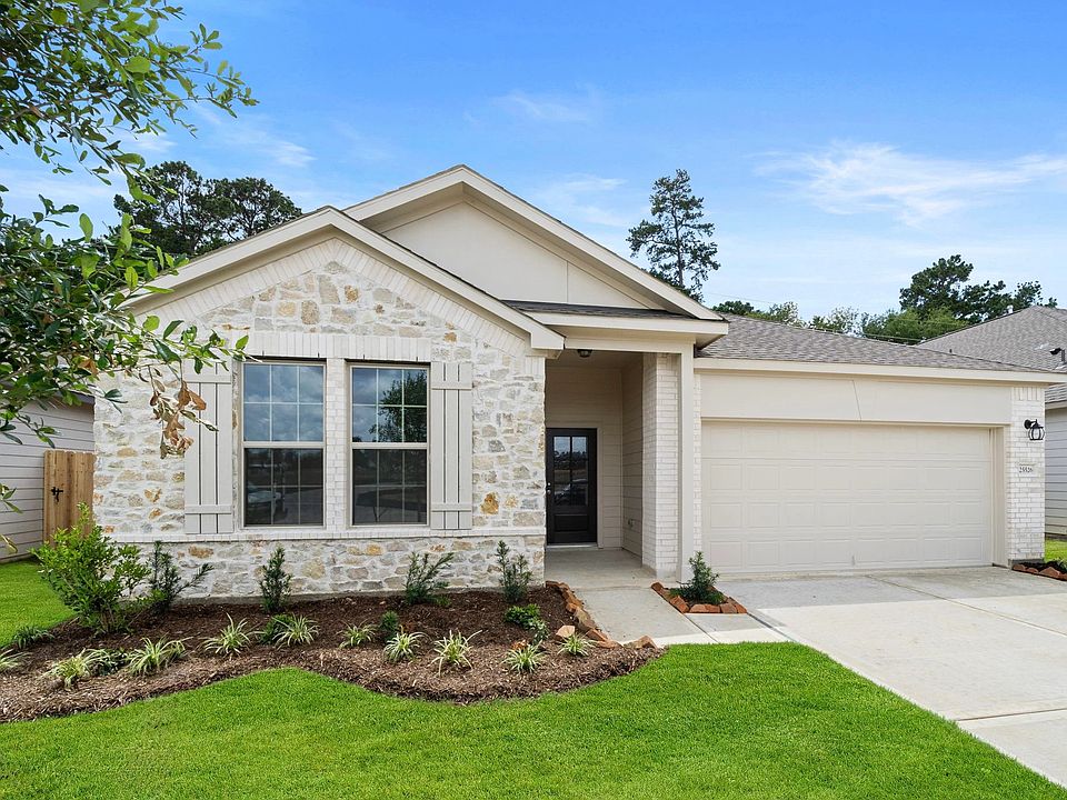 Welcome home to 25562 West Blackwater Creek Trail located in the community of Spring Creek Trails an