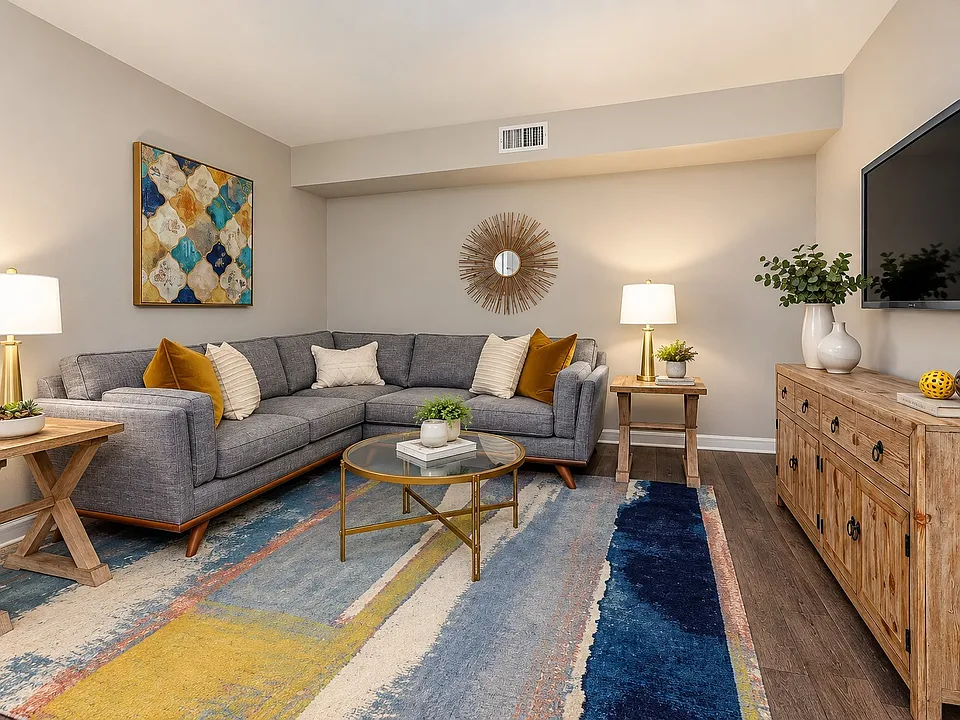 Step into the inviting living space at Manatee Bay, where comfort meets style. The modern decor and cozy ambiance create the perfect backdrop for relaxation. Explore your new home today for a lifestyle you'll love!