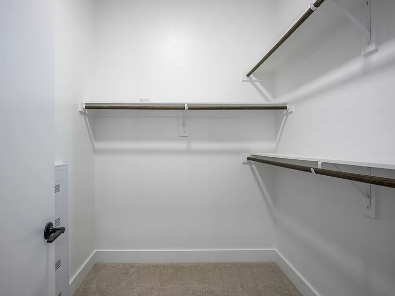Discover spacious elegance at Modera Trinity. Our large closets, adorned with wood finishes offer the perfect blend of luxury and functionality for your storage needs.