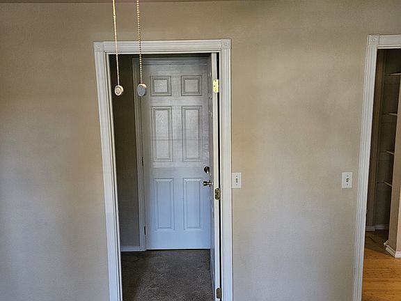 Bedroom 1 Closet and door to bathroom.