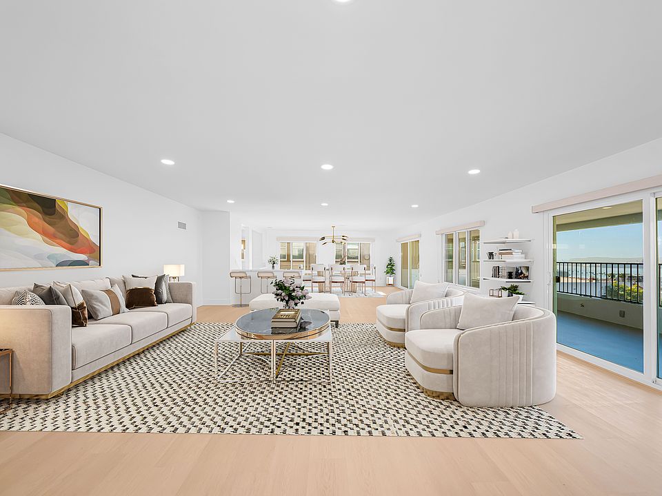 Living Area with Covered Patio To Your Right.