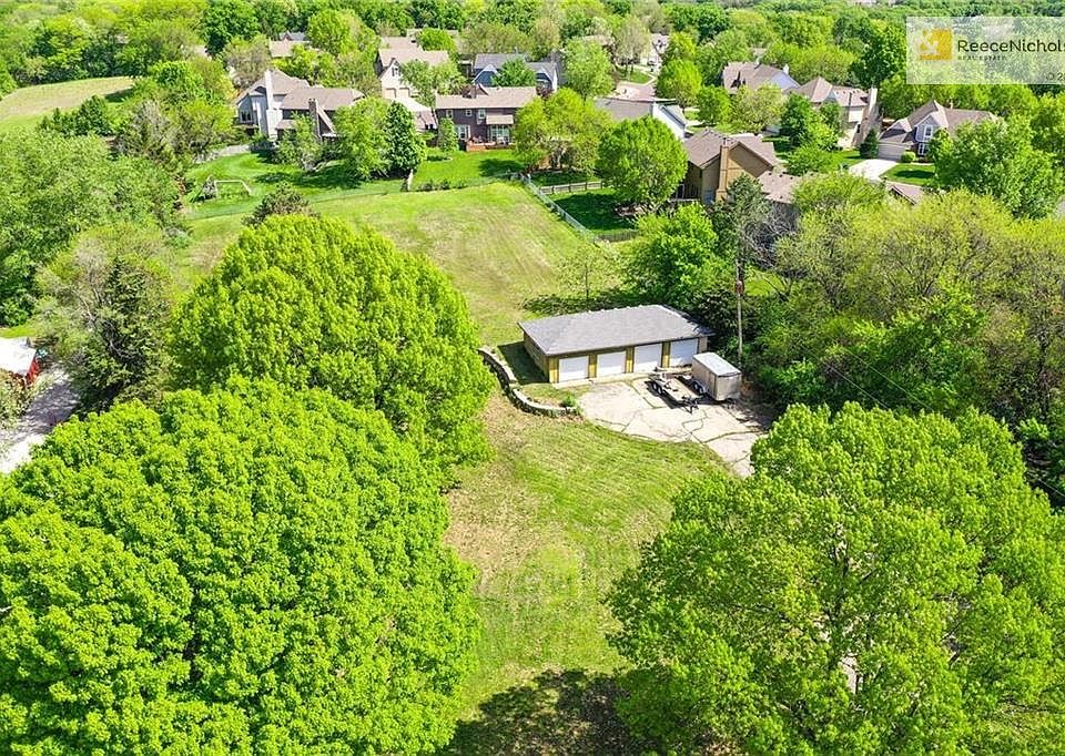 Beautiful, Estate Lot w/ additional space behind the 4-car garage.