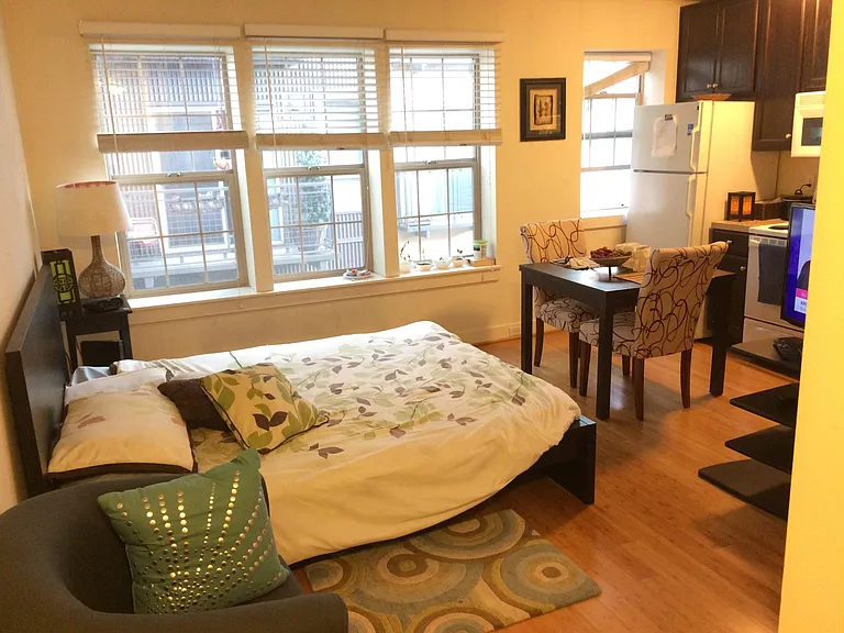 Studio has a full kitchen (fridge, freezer, range, microwave, sink, and lots of cabinetry.