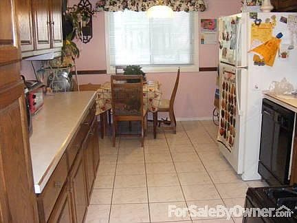 Second Bedroom
						:
						Second bedroom with ample closet space and view of the wooded area.